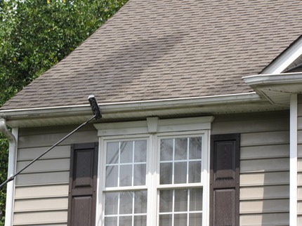 Marc’s on the Glass gutter restoration, hand cleaning black stains on gutters in Richmond VA