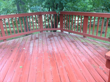 before picture of a deck in richmond that has a good stain, but is still susceptible to mold and algae.  just a basic soft wash will remove the problem and extend the life of the deck stain